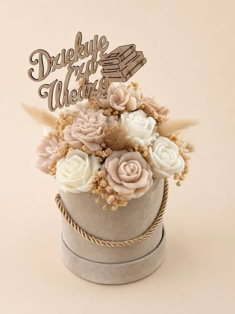 Beige cylindrical box arrangement with cream and blush roses, dried grasses, and wooden Dziekuje Usercontent topper sign